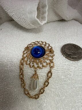 Gold-Tone Brooch with Deep Blue Cabochon and Faux Pearl Drop
